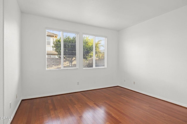 3806 Golden Pond Dr, Camarillo, CA 93012 - spare room with wood-type flooring and baseboards