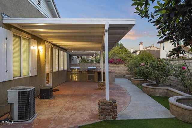 3806 Golden Pond Dr, Camarillo, CA 93012 - patio terrace at dusk with central air condition unit, a fenced backyard, and a patio
