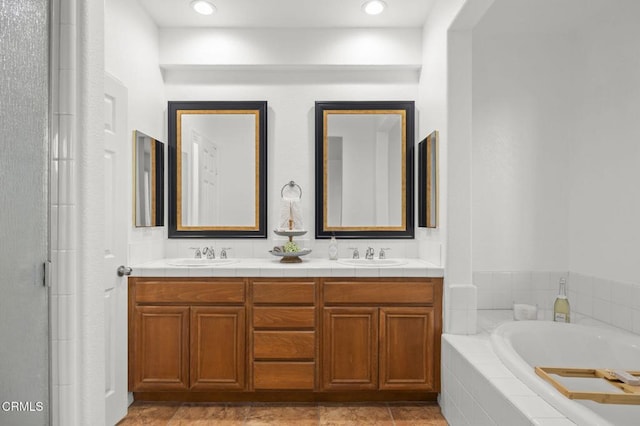 3806 Golden Pond Dr, Camarillo, CA 93012 - full bath featuring double vanity, a garden tub, and a shower with door