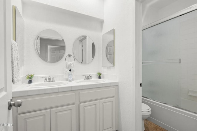 3806 Golden Pond Dr, Camarillo, CA 93012 - full bath with toilet, double vanity, and enclosed tub / shower combo