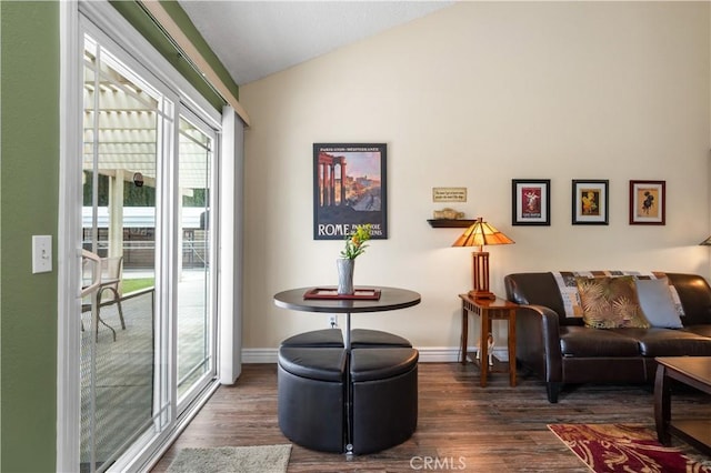 454 E Merrimac St, Upland, CA 91784 - living area featuring dark wood finished floors, lofted ceiling, and baseboards
