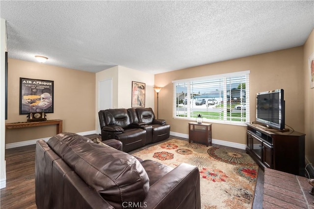 454 E Merrimac St, Upland, CA 91784 - living room with a textured ceiling, baseboards, and wood finished floors
