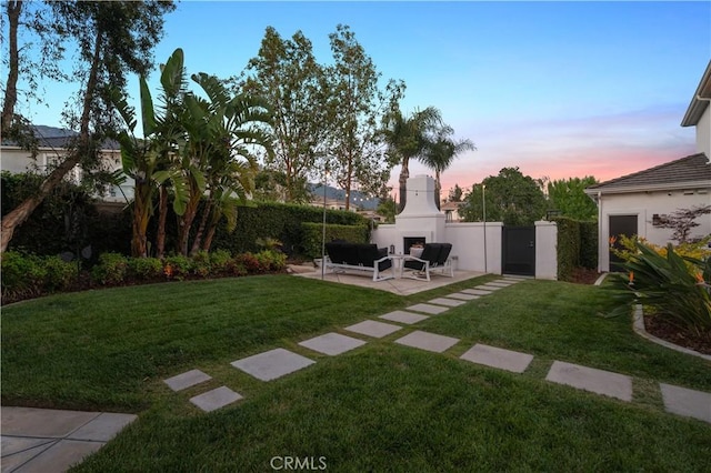 2229 N 3rd Ave, Upland, CA 91784 - view of yard featuring exterior fireplace and a patio area