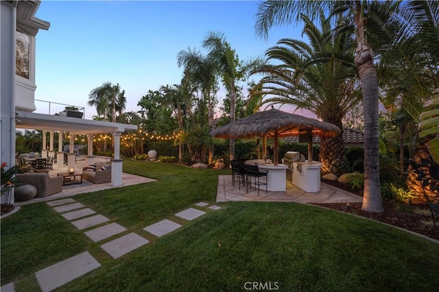2229 N 3rd Ave, Upland, CA 91784 - view of green lawn featuring a patio area and outdoor lounge area