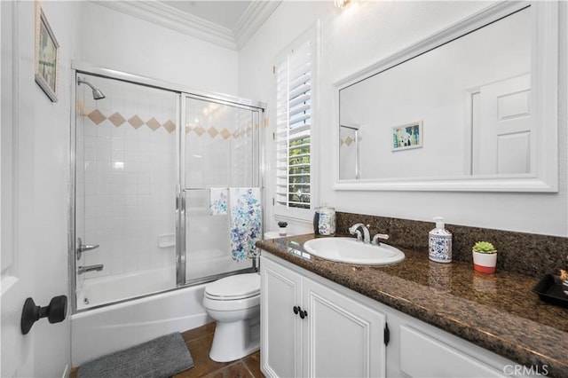 2229 N 3rd Ave, Upland, CA 91784 - full bathroom with crown molding, toilet, vanity, and shower / bath combination with glass door