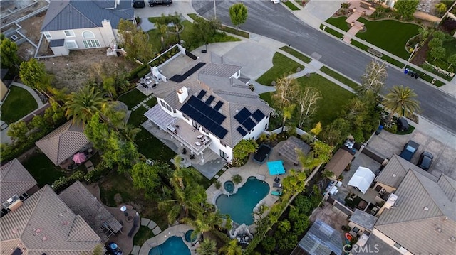 2229 N 3rd Ave, Upland, CA 91784 - aerial overview of property's location featuring a pool area and nearby suburban area