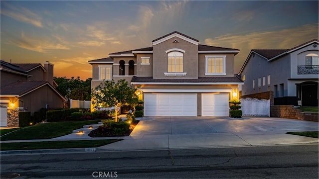 3147 Pinehurst Dr, Corona, CA 92881 - view of front of house featuring stucco siding, an attached garage, and concrete driveway