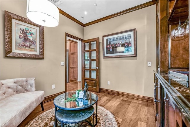 638 Sierra Madre Blvd Unit D, Sierra Madre, CA 91024 - living area featuring baseboards, wood finished floors, and crown molding