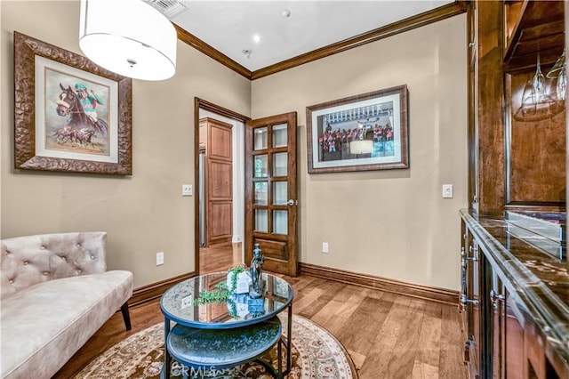 638 Sierra Madre Blvd Unit D, Sierra Madre, CA 91024 - sitting room with wood finished floors and crown molding