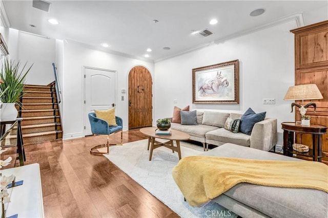 638 Sierra Madre Blvd Unit D, Sierra Madre, CA 91024 - living room featuring wood finished floors, stairs, arched walkways, crown molding, and recessed lighting