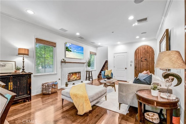 638 Sierra Madre Blvd Unit D, Sierra Madre, CA 91024 - living area with ornamental molding, a glass covered fireplace, healthy amount of natural light, stairway, and recessed lighting