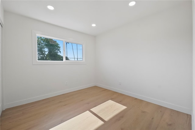 623 S Homerest Ave, Azusa, CA 91702 - spare room featuring baseboards, light wood-style flooring, and recessed lighting