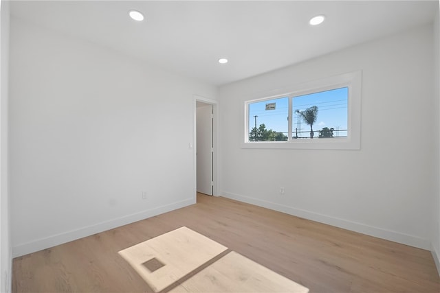 623 S Homerest Ave, Azusa, CA 91702 - spare room with baseboards, light wood-style floors, and recessed lighting