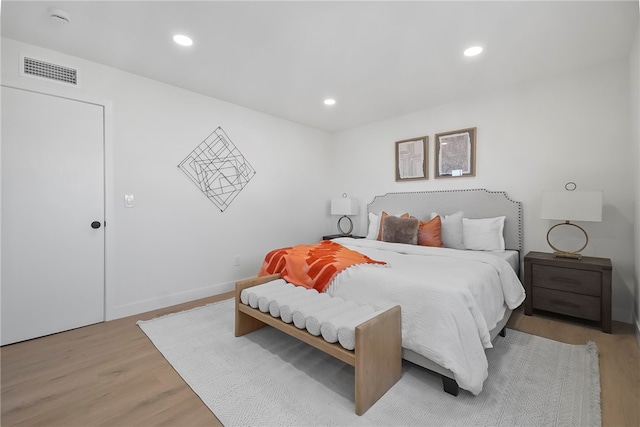623 S Homerest Ave, Azusa, CA 91702 - bedroom with light wood-style flooring, recessed lighting, and baseboards