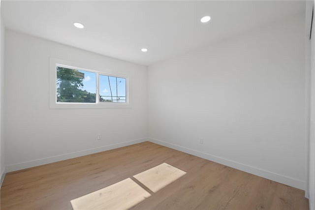 623 S Homerest Ave, Azusa, CA 91702 - spare room with light wood-style flooring, baseboards, and recessed lighting