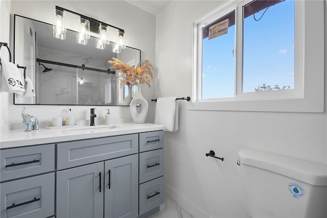 623 S Homerest Ave, Azusa, CA 91702 - full bath with toilet, vanity, a stall shower, marble look tile flooring, and baseboards