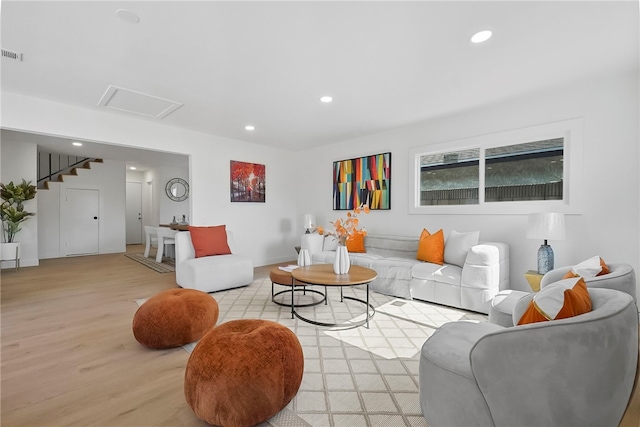 623 S Homerest Ave, Azusa, CA 91702 - living room featuring light wood finished floors, recessed lighting, and attic access