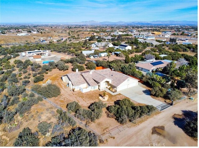 9920 Sage St, Oak Hills, CA 92344 - drone / aerial view of a mountain backdrop