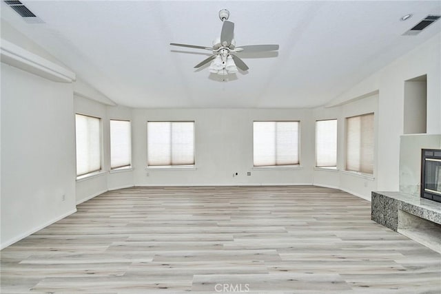 9920 Sage St, Oak Hills, CA 92344 - unfurnished living room with lofted ceiling, ceiling fan, light wood-style floors, a high end fireplace, and baseboards