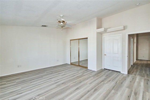 9920 Sage St, Oak Hills, CA 92344 - spare room featuring a ceiling fan, light wood-style floors, baseboards, and a smoke detector