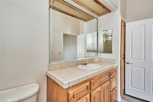 9920 Sage St, Oak Hills, CA 92344 - bathroom featuring vanity and toilet