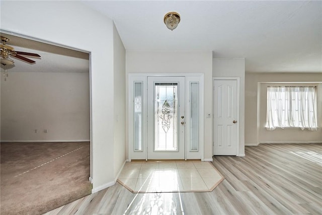 9920 Sage St, Oak Hills, CA 92344 - foyer featuring a ceiling fan, baseboards, and wood finished floors