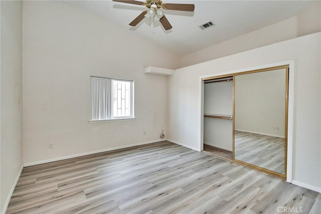 9920 Sage St, Oak Hills, CA 92344 - unfurnished bedroom featuring vaulted ceiling, wood finished floors, a closet, baseboards, and ceiling fan