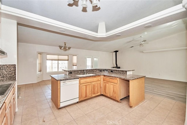 9920 Sage St, Oak Hills, CA 92344 - kitchen featuring ceiling fan, white dishwasher, a sink, and a raised ceiling