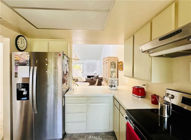 4 Camphor S, Irvine, CA 92612 - kitchen featuring appliances with stainless steel finishes, under cabinet range hood, light countertops, and cream cabinetry