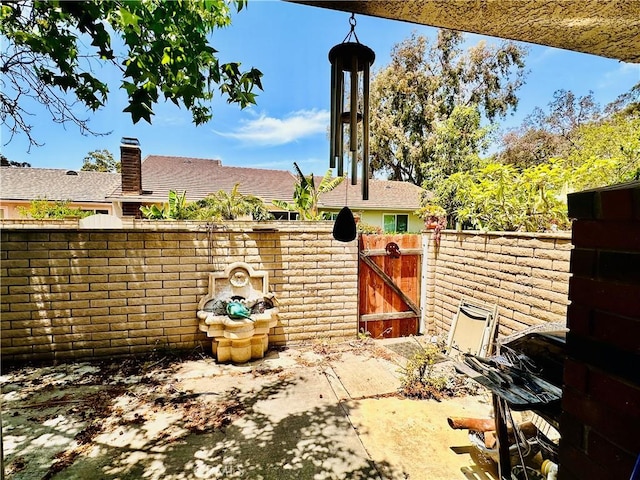 4 Camphor S, Irvine, CA 92612 - view of patio / terrace with a gate