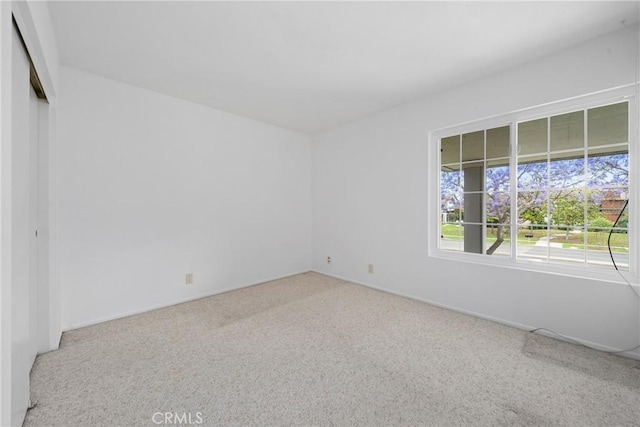 43 W Yale Loop Unit 29, Irvine, CA 92604 - empty room featuring carpet floors and baseboards
