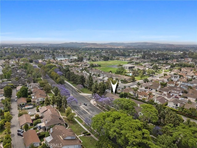 43 W Yale Loop Unit 29, Irvine, CA 92604 - aerial view of property's location with nearby suburban area and a mountain backdrop