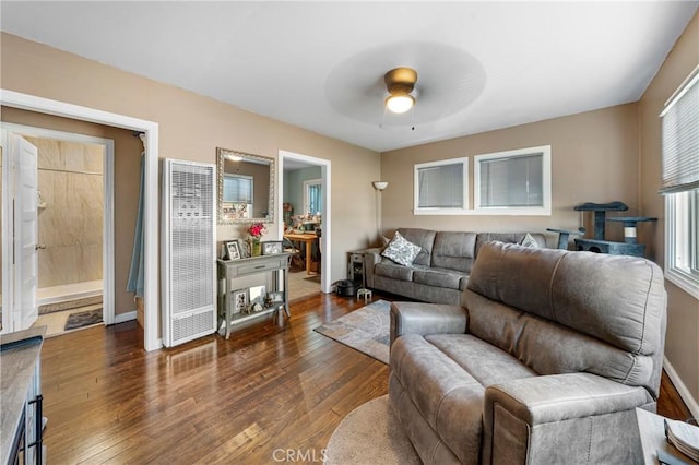 20927 Shearer Ave, Carson, CA 90745 - living room featuring a heating unit, a ceiling fan, wood finished floors, and baseboards