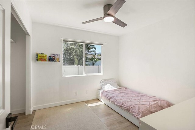 17913 Maplehurst Pl, Canyon Country, CA 91387 - bedroom featuring wood finished floors, a ceiling fan, and baseboards