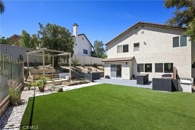 17913 Maplehurst Pl, Canyon Country, CA 91387 - back of house featuring a patio, stucco siding, and a pergola