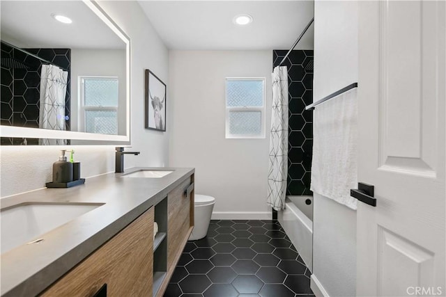 17913 Maplehurst Pl, Canyon Country, CA 91387 - full bath with double vanity, toilet, shower / bathtub combination with curtain, tile patterned floors, and baseboards