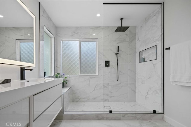 17913 Maplehurst Pl, Canyon Country, CA 91387 - bathroom featuring marble finish flooring, vanity, a marble finish shower, plenty of natural light, and recessed lighting