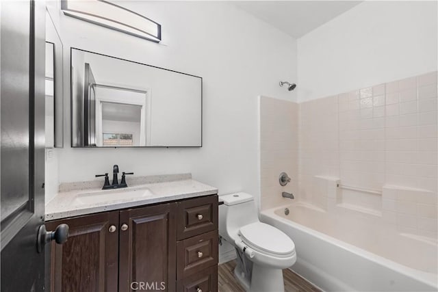 2904 Granite Ridge Pl, Bakersfield, CA 93313 - bathroom featuring vanity, toilet, shower / bathtub combination, and wood finished floors