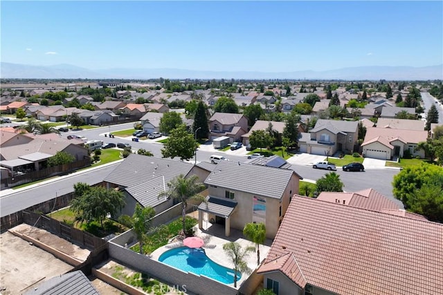 2904 Granite Ridge Pl, Bakersfield, CA 93313 - aerial perspective of suburban area with a pool and a mountain backdrop