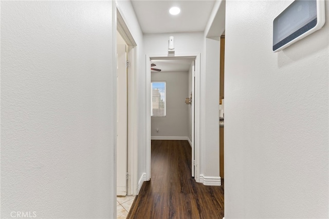 3883 Taconite Rd, San Bernardino, CA 92407 - hall with baseboards and wood finished floors