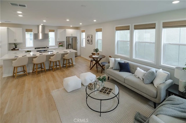 21 Welltree Way, Rancho Mission Viejo, CA 92694 - living area featuring light wood-style floors and recessed lighting