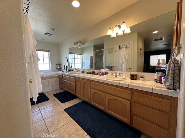 8843 San Diego Dr, Yucca Valley, CA 92284 - bathroom with tile patterned floors, a shower stall, double vanity, and recessed lighting