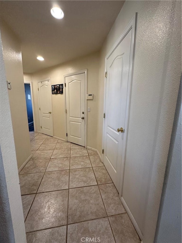 8843 San Diego Dr, Yucca Valley, CA 92284 - hall with light tile patterned flooring and recessed lighting