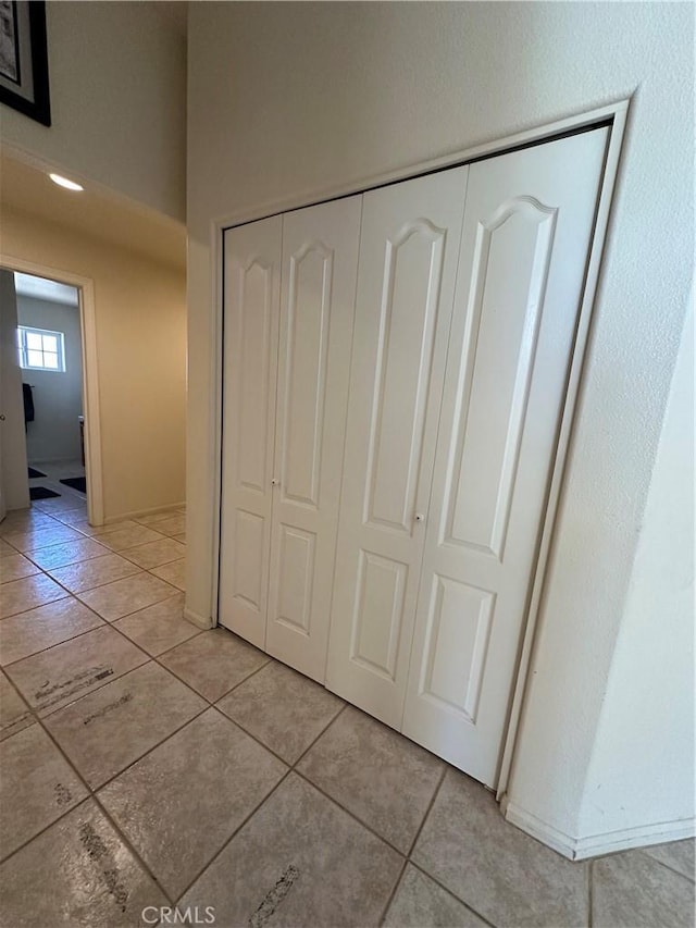 8843 San Diego Dr, Yucca Valley, CA 92284 - hallway featuring light tile patterned flooring
