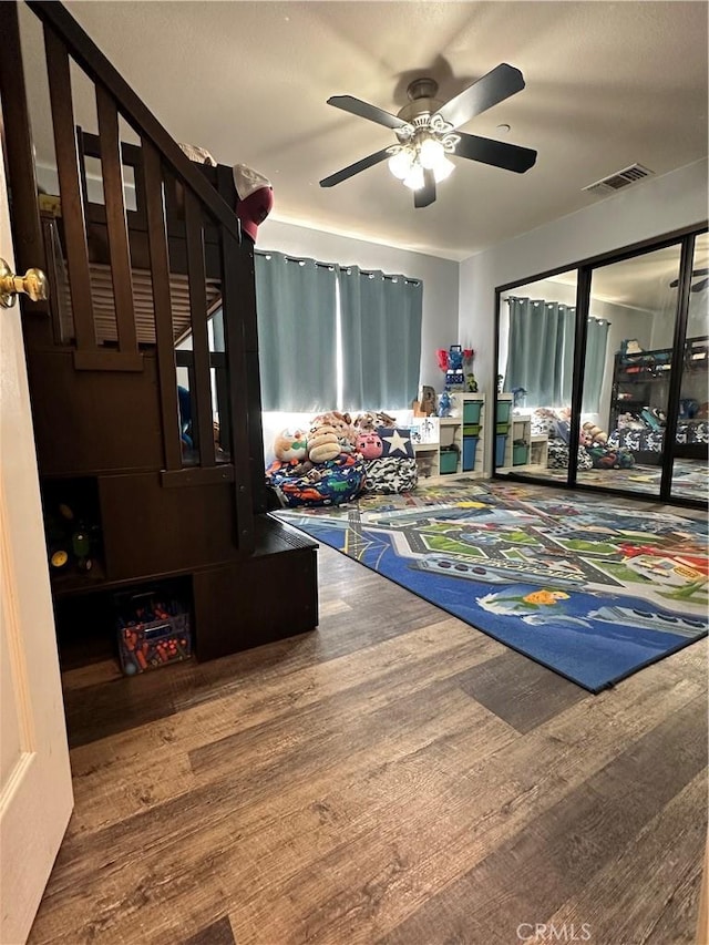 8843 San Diego Dr, Yucca Valley, CA 92284 - interior space featuring wood finished floors and a ceiling fan