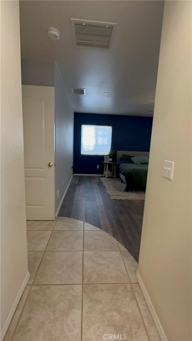 8843 San Diego Dr, Yucca Valley, CA 92284 - corridor featuring tile patterned flooring and baseboards