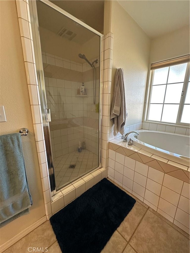 8843 San Diego Dr, Yucca Valley, CA 92284 - full bathroom featuring a stall shower, tile patterned floors, a textured wall, and a bath