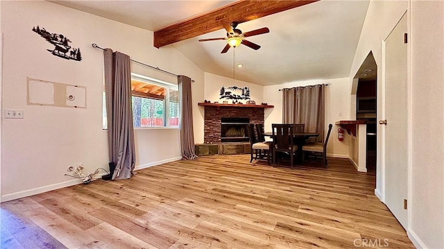 2051 6th Ln, Big Bear, CA 92314 - living area with a ceiling fan, wood finished floors, a stone fireplace, and baseboards