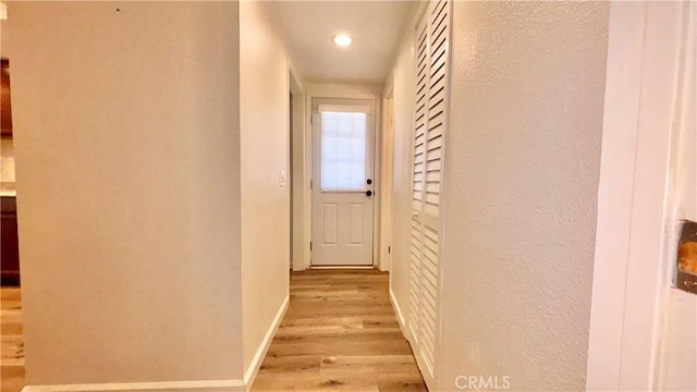 2051 6th Ln, Big Bear, CA 92314 - hall featuring light wood finished floors, recessed lighting, a textured wall, and baseboards