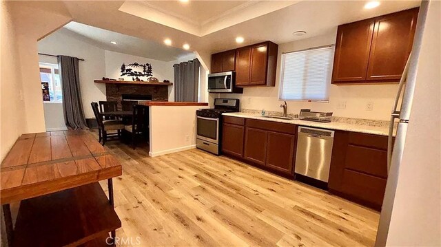 2051 6th Ln, Big Bear, CA 92314 - kitchen with stainless steel appliances, light wood finished floors, a sink, light countertops, and recessed lighting